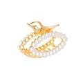 Macro shot of gold alloy hair claw clip with white pearls and premium spring mechanism - Double Loop Oval / Oval Pearl Style (C4107)