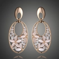 Hohl geschliffene ovale Ohrstecker in Roségold mit Katzenaugenstein-Blumen und Kristallen - Gold