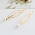 Minimalist gold leaf hair pins with round white pearls on a clean white background - Gold (E5111)