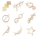 Set da 9 fermagli per capelli dorati con stelle, cuori e perle su fondo bianco - Set Oro