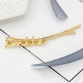Minimalist gold alloy hair clip featuring a stylish smile letter script design - Gold Smile