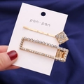 Elegante set di 2 fermagli per capelli con strass e diamanti geometrici su scheda - Bianco