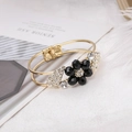 Golden double-layer rhinestone bracelet with black crystal flower and diamond centerpiece - Black