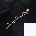Elegant rose gold wavy hair clip featuring a sparkling pink rhinestone accent for women - Pink