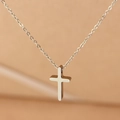 Minimalistische zilverkleurige roestvrijstalen ketting met gepolijste mini kruis hanger dames - Staalkleur