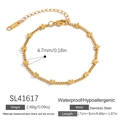 Elegante bracciale in acciaio inossidabile placcato oro 18K con piccoli ciondoli a fiore - Design a Fiore (SL41617)