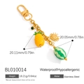 Porte-clés en acier inoxydable doré avec pendentifs ananas pastèque et pierre verte - Style Ananas Soleil Pastèque (BL010014)