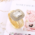 Elegant gold-plated wide ring with large rectangular crystal and sparkling pave stones - White