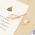 Elegante pinza para el pelo con lazo de oro rosa y perla blanca para peinados estilo coreano - Oro rosa