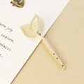 Barrette à cheveux dorée avec design de feuilles ajourées et cristal sur support - Or
