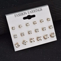 Set de 12 pares de pendientes de botón con diamantes de imitación en color dorado - Juego de Pendientes de Botón de Strass Redondos con Engaste de Garras de Oro (6 B2104)