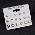 Set de 9 pares de pendientes con bolas plateadas, circonitas claras y perlas blancas - Juego Combinado de Perla Artificial y Strass de Bola de Plata (9 B2104)