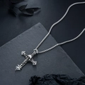 Macro shot of gothic cross pendant featuring skull relief on retro square pearl chain - Cross Skull Style (L850-A)