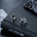 Close-up of gothic cross earrings with black zircon stones and hollow floral design - Black Zircon Cross Style (X1038-C)