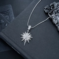 Macro d'un pendentif étoile à huit branches en argent serti de zircons sur chaîne - Argent (L860-B)