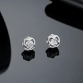Symmetric silver floral heart earrings with clear zircon stone on black reflective surface - Silver Style (X935-A)