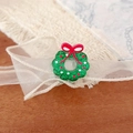 Green glitter Christmas wreath brooch with red bow on festive holiday background - Mini Christmas Wreath