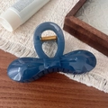 Detail of elegant navy blue bow hair claw clip with golden metal spring mechanism - Haze Blue Bowknot