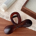 Detail of 10.5cm dark brown tortoiseshell hair claw clip with elegant bow design - Matte French Bowknot