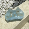 Detail view of light blue acrylic cat hair claw clip on natural stone background - Blue Cat / Approx. 8cm / Blue
