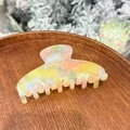 Iridescent mermaid acetate hair claw clip with colorful marble pattern on wooden tray - Multicolor Green Yellow (10.5cm)