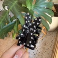 Détail d'une pince à cheveux lapin en acétate noir ornée de strass brillants et accents blancs - Noir - Lapin Strass (Environ 6,5cm)