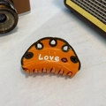 Retro-Haarklammer aus Acetat mit Love-Schriftzug und Lippenmuster in Orange und Braun - Orange Kaffee