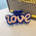 Grande molletta per capelli blu in acetato con scritta artistica love per acconciature - Grande / Blu