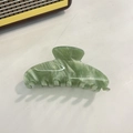 Close-up of green marble acetate hair claw clip with translucent mermaid finish detail - Palm Green Marble / 10.5cm