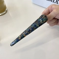 Detail of marble pattern acetate alligator hair clip showing handmade text and texture - Blue Marble Pattern Horn Clip