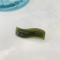 Close-up of wavy green resin hair clip featuring gold SANSHINE Handmade lettering - Green Jelly