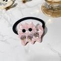 Detail of pink marble acetate cat hair clip with sparkling heart-shaped crystals - Hair Tie / Pink