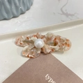 Detail of flower-shaped acetate hair clip with marble texture and white pearl accent - Cream Orange - Pearl Butterfly Duckbill Clip (Approx 5cm)