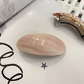 Set of two minimalist acetate hair clips with marble texture on artistic white background - Oval Spring Clip / Pink Buttercream