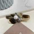 Macro detail of acetate flower hair clip with marble texture and pearl center - Grey Brown Striped - Pearl Butterfly Duckbill Clip (Approx 5cm)