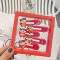 Detail of red Chinese New Year hair clips with cute girls dolls in a square display box - Auspicious Fortune Doll (Gift Box Set)