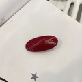 Close-up of deep red acetate hair clip with gold France Handmade lettering detail - Oval Duckbill Clip (5cm) / Red