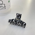 Elegant medium acetate hair claw clip with black and white ink pattern and gold text - T-Shape Claw / Zebra Print