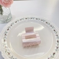 Detail of pink marble textured hollow hair claw clip on a floral patterned ceramic plate - Small Square (5cm) / Pink Stripe