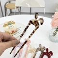 Detailed macro view of colorful acetate rabbit ear hair sticks in various elegant patterns - Black Coffee Jelly - Rabbit Ear Hair Stick (Approx 14.7cm)