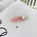 Close-up of a pink rectangular resin hair clip with a silver metal duckbill base - Pink Jelly