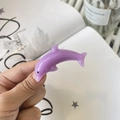 Detail of light purple dolphin hair clip made of smooth translucent resin - Purple Jelly Dolphin Style