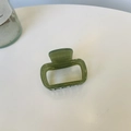 Detailed top view of a green acetic acid square hair claw clip with golden text logo - Small Size (approx. 5cm) / Transparent Green