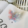 Detail view of double-layered butterfly hair claw with dreamy pink-blue marble texture - Gradient Red Blue