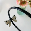 Elegante zwarte acetaat hoofdband met antislip tanden en crème strik voor dames - Smalle Hoofdband / Witte Zwarte Rand Strik (zrazx-250078)