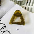 Translucent olive green triangular hair claw clip with golden spring on white magazine - Approx 6cm / Transparent Yellow Green