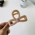 Close-up of nude pink bow hair claw clip showing golden metal spring and acrylic texture - Deep Nude Pink - Bow Buckle Square Bow