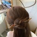 Minimalist amber tortoise shell hair pin for bun styling shown on brown hair back view - Blueberry Milk Jelly