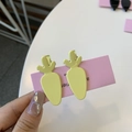 Close-up of cute carrot shaped yellow matte hair clips on a pink display card set - Carrot Duckbill Clip / Yellow