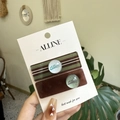 Retro-Haarspangen-Set in Braun und gestreiftem Grün auf einer Markenkarte präsentiert - Grün & Braun